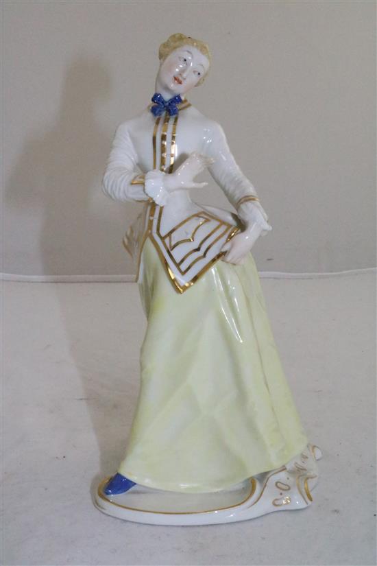 A Nymphenburg porcelain figure of Julia, after the Komedia Del arte figure by Bustelli, 20th century, 8.25in.